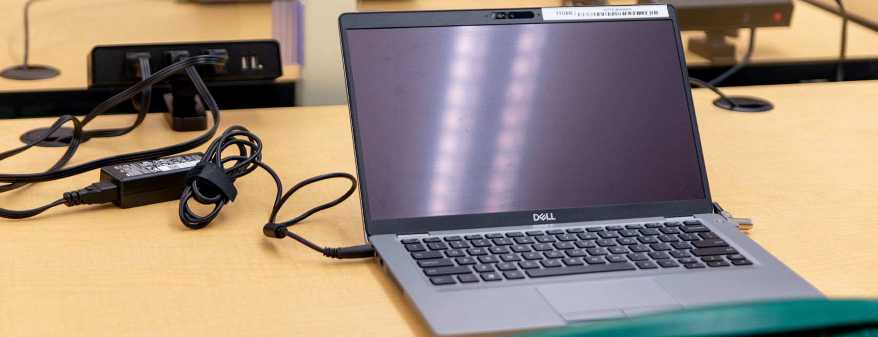 Laptop on table in computer lab