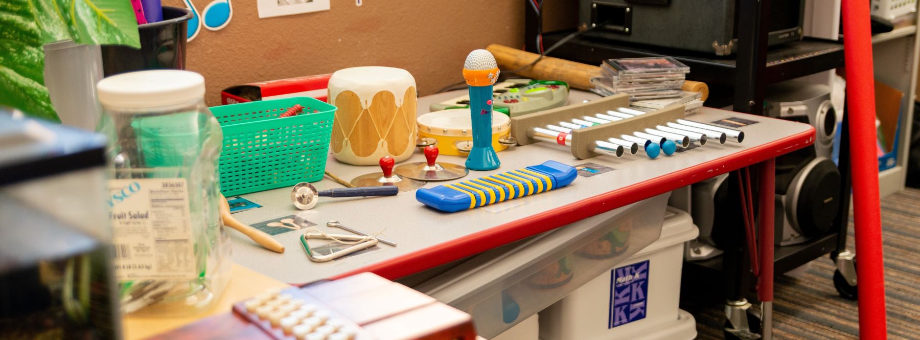 classroom area with various musical instruments