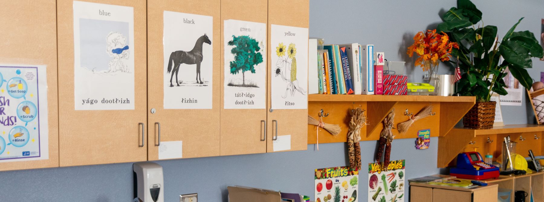 A colorful and inviting classroom filled with shelves of various children's books.